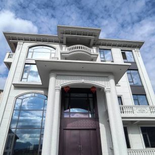 朔州白麻别墅外墙干挂石材效果示例