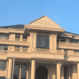 朔州黄金麻别墅外墙干挂石材效果示例