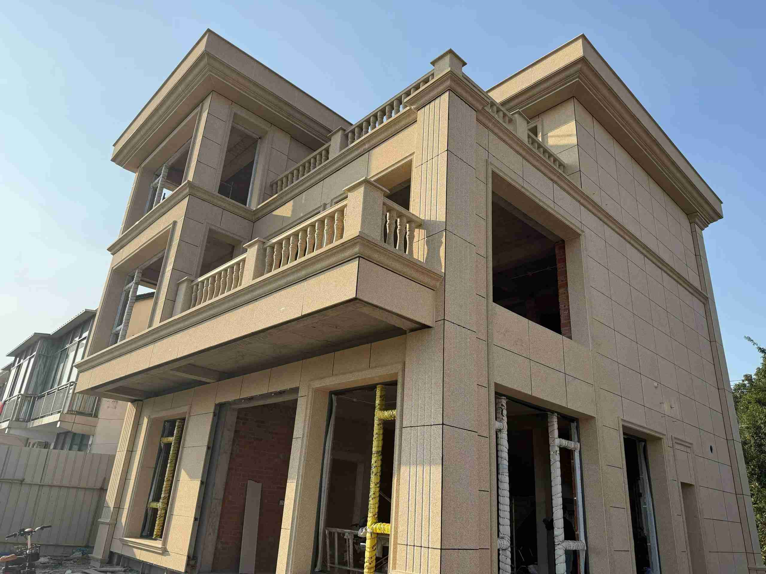 朔州 黄金麻花岗岩石材荔枝面外墙干挂效果展示